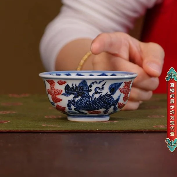 【央广非遗】林涛小馆釉里红外麒麟内缠枝玉壁底压手杯ltxg907