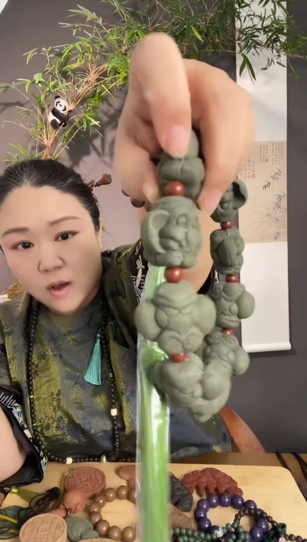 泥塑青瑶露小象手持