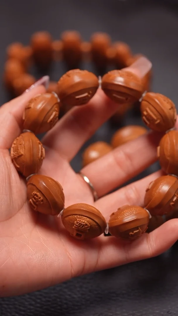 手串橄榄核2..3+四花钱币通宝