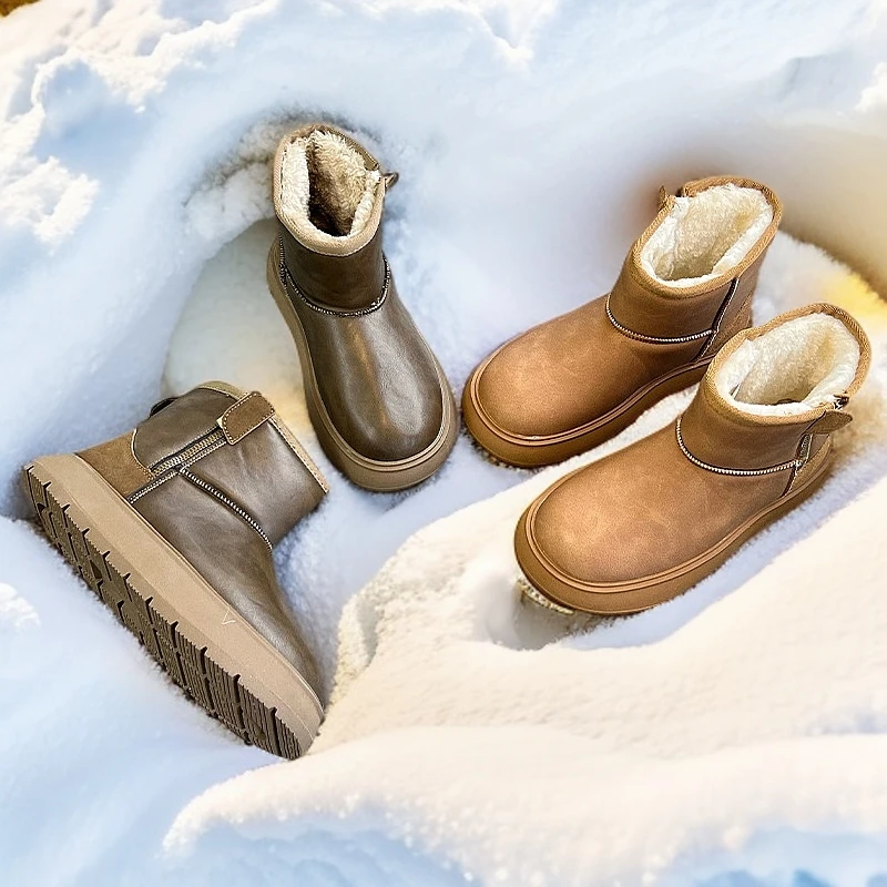 真皮保暖雪地靴女2024冬季新款时尚短筒百搭短靴女厚底复古马丁靴