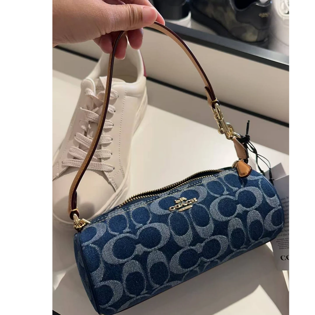 COACH蔻驰 丹宁 NOLITA圆筒手拿包CZ459 19.5*8.5*8.5