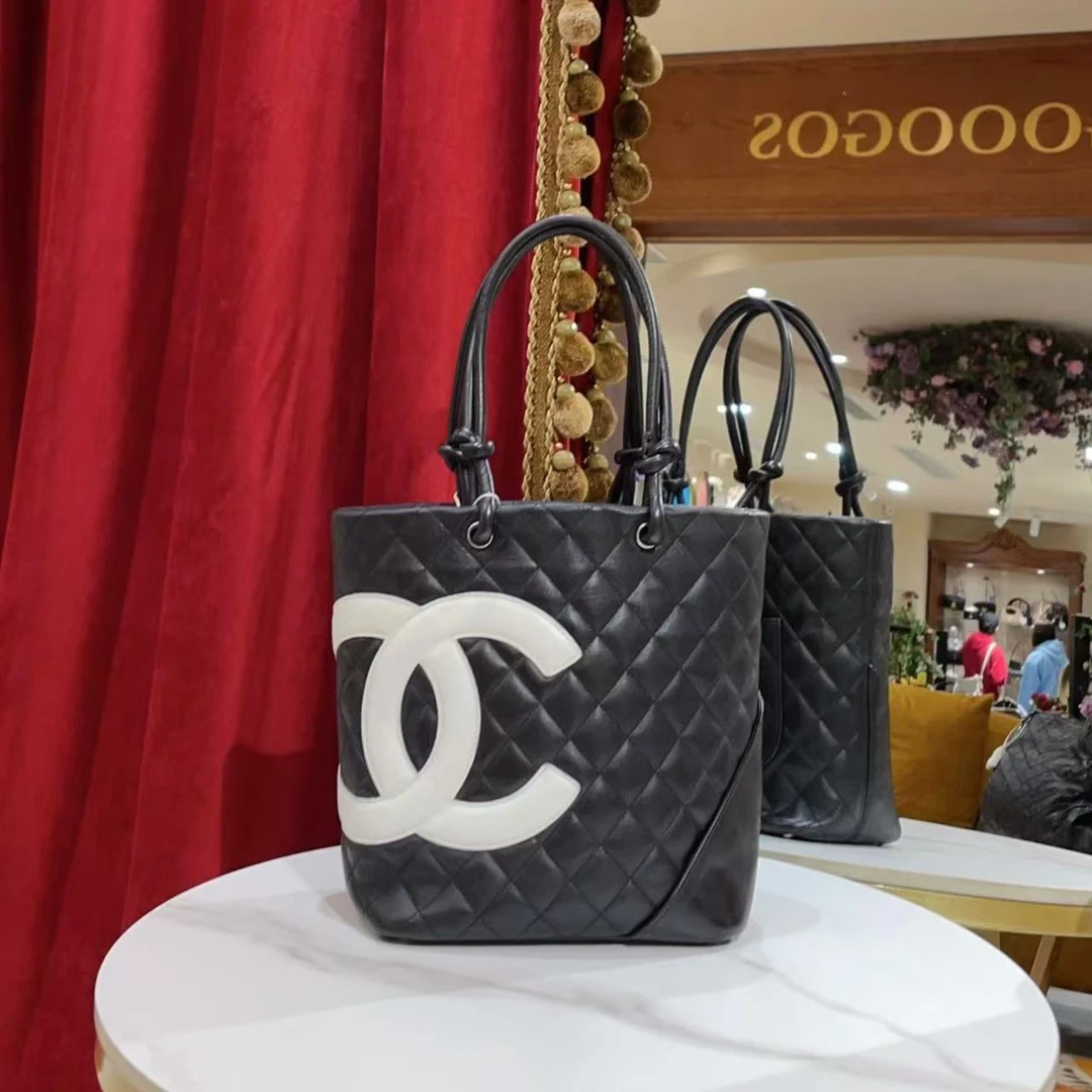 95新 Chanel/香奈儿 康鹏菜篮子小号黑白羊皮手拿手提包52803989