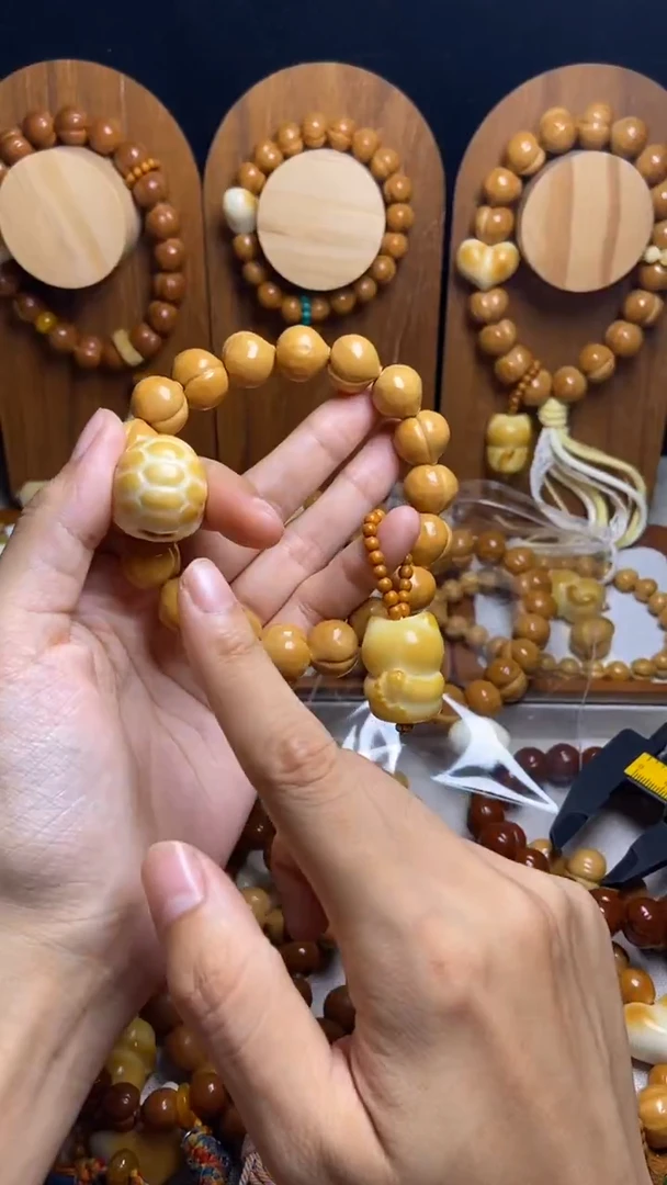 手串猴头核桃悄***条全品光面富甲橄榄壳吊坠悟道猫手串