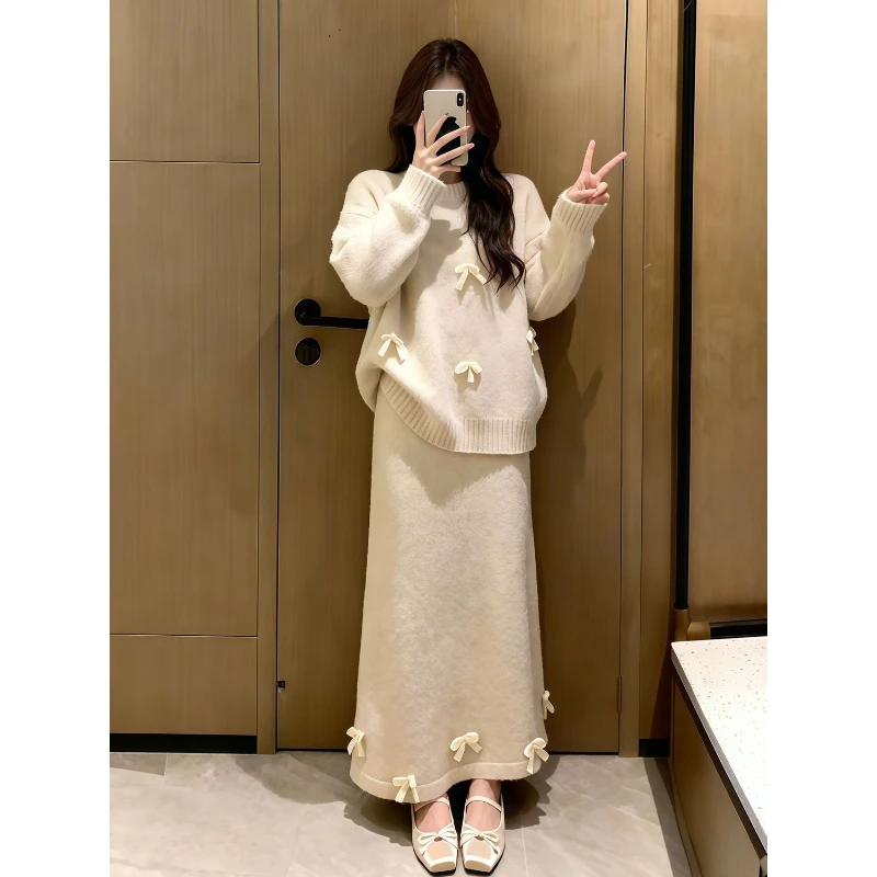 2025年冬季跨年氛围感穿搭蝴蝶结套头毛衣半身裙减龄两件套装