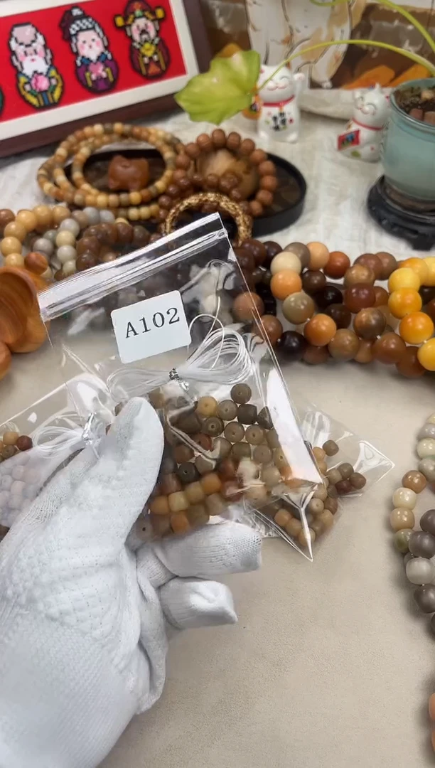 手串菩提根/象牙果a102 卡0.8 机抛老料50 颗