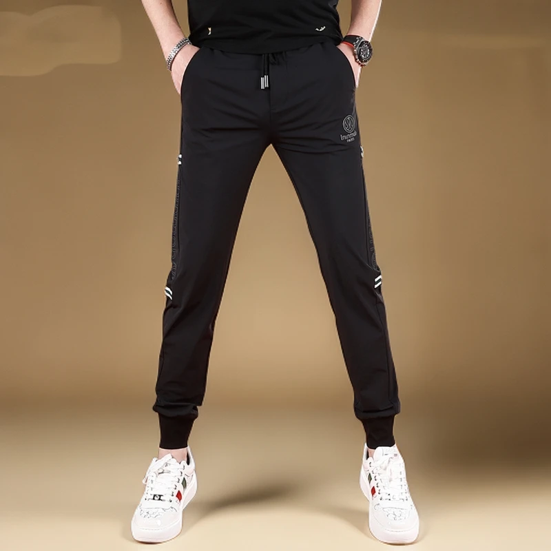 2025夏季薄款裤子男款潮流新款修身小脚长裤弹力冰丝男士休闲裤