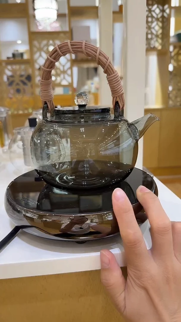 北大史烟灰藤编提梁壶