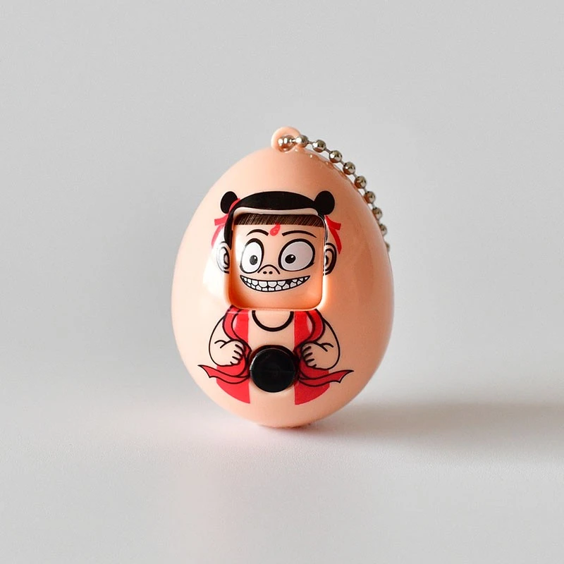 哪吒变脸蛋挂件四种表情解压款猜拳蛋动漫周边钥匙链疯狂搞笑可爱