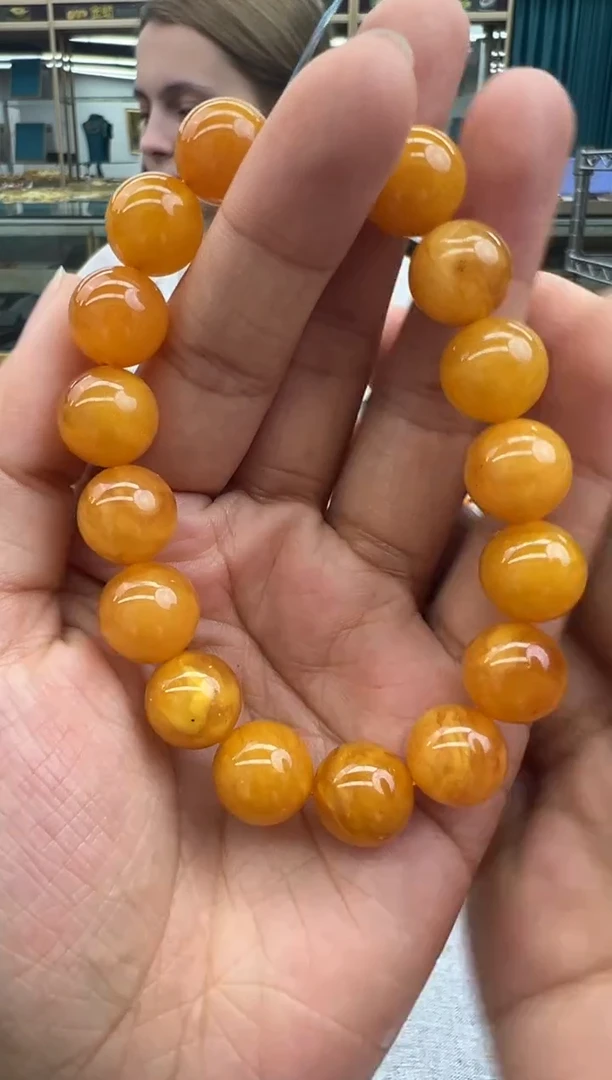 未镶嵌琥珀手串140秒拍号假一罚十