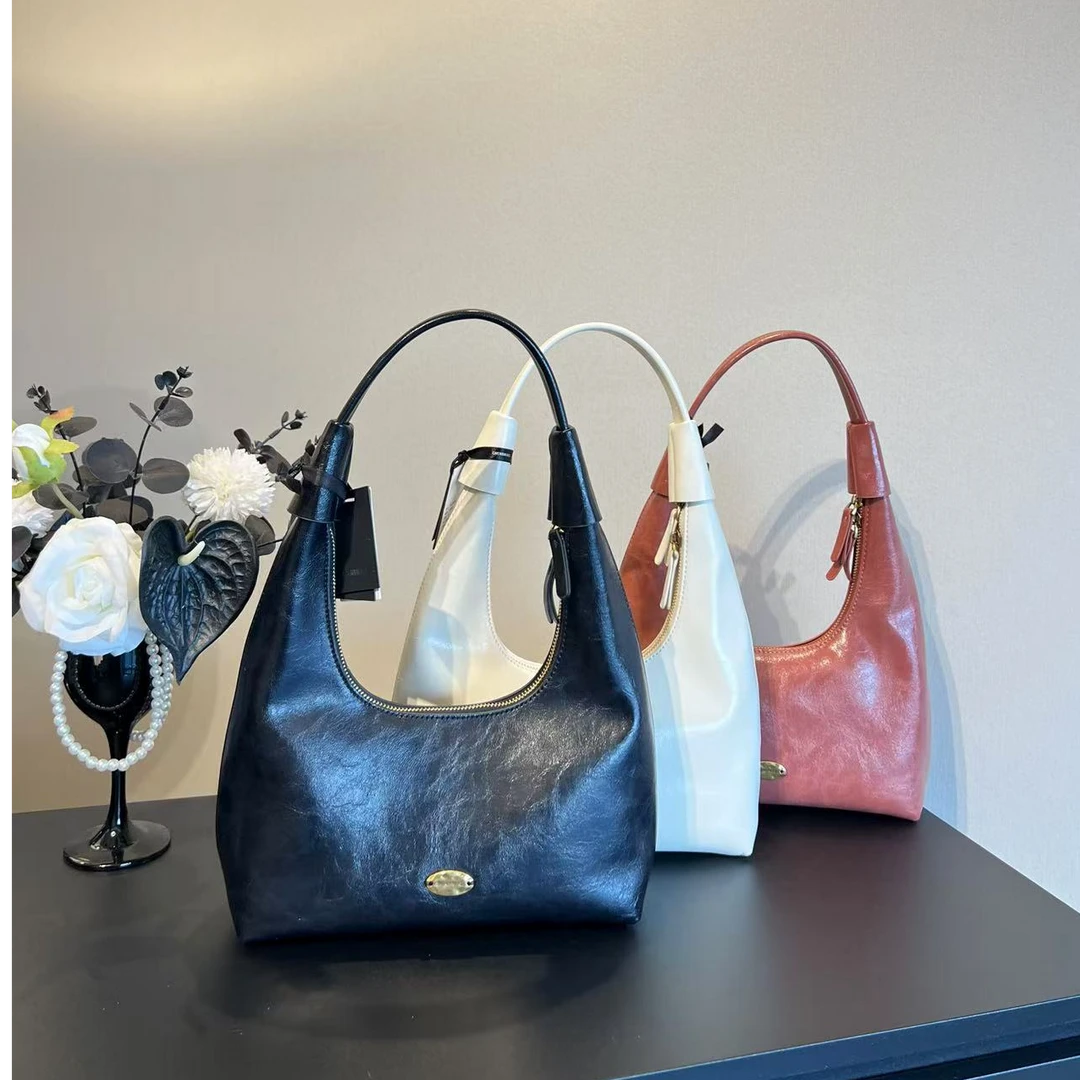 2025新款时尚甜美高级百搭简约单肩斜挎包小众月芽包轻奢女士