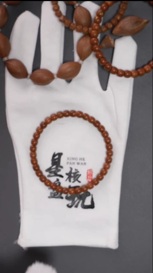 手串橄榄核心****.6.2mm老挝极限弧高红正三花面无白单圈核尖手串