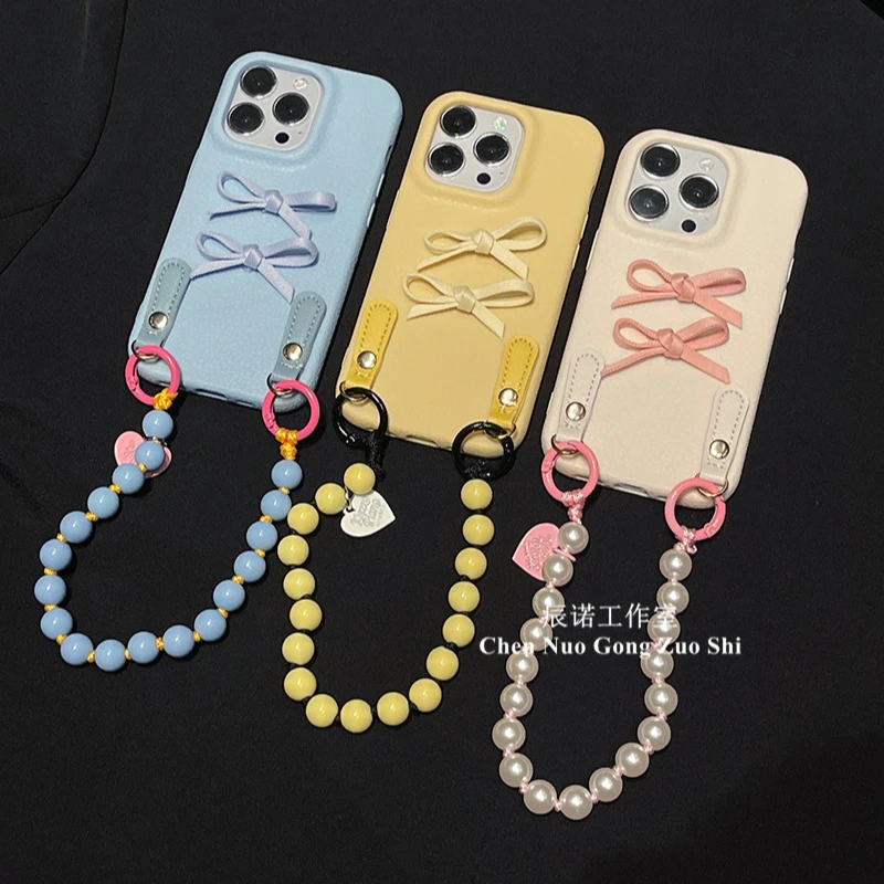 适用苹果华为荣耀oppo/vivo小米手机壳皮纹蝴蝶结手提斜挎绳软壳