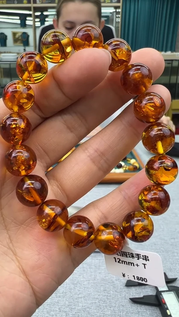 未镶嵌琥珀手链5秒拍号假一罚十