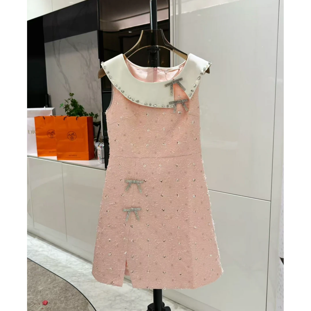 亿蒽 气质小香风娃娃领无袖连衣裙显瘦甜美开叉包臀裙 202530912A