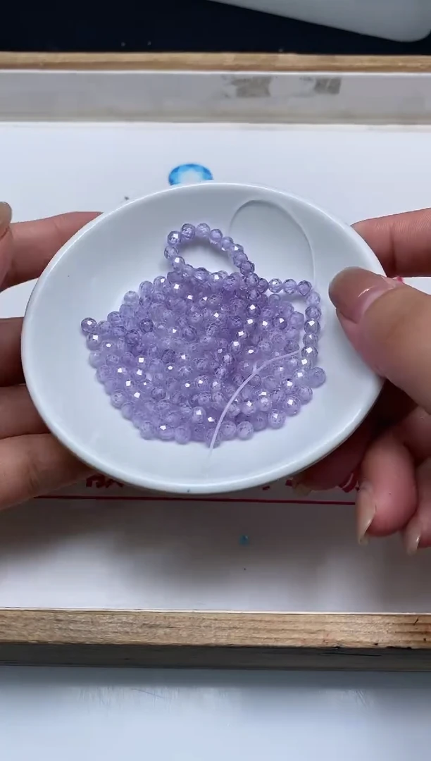 散珠天然锆石未镶嵌D718 冰紫锆石切4mm30个6.8元