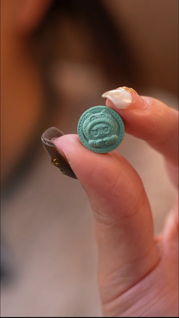 未镶嵌绿松石雕刻件拉布布