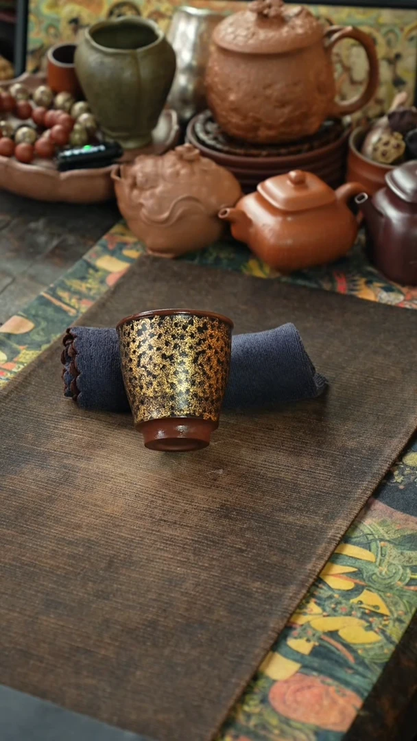 九斋金银搓紫砂杯