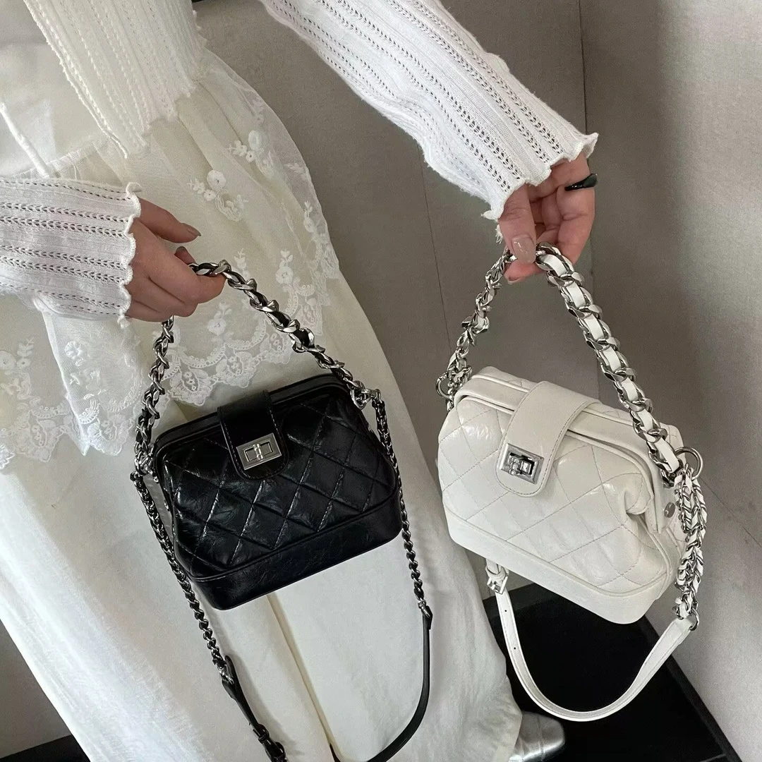 包包休闲流浪包小众草编斜挎式镂空大号单肩包邮差腋下大包包盒子