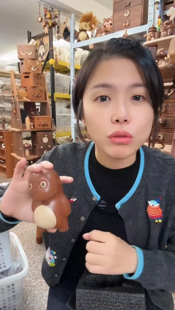 木乌檀木奶龙摆件