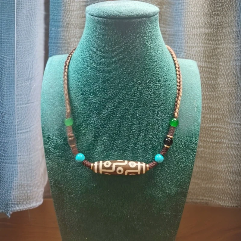 C291藏式九洞小天天玛瑙配手工编织绳脖挂