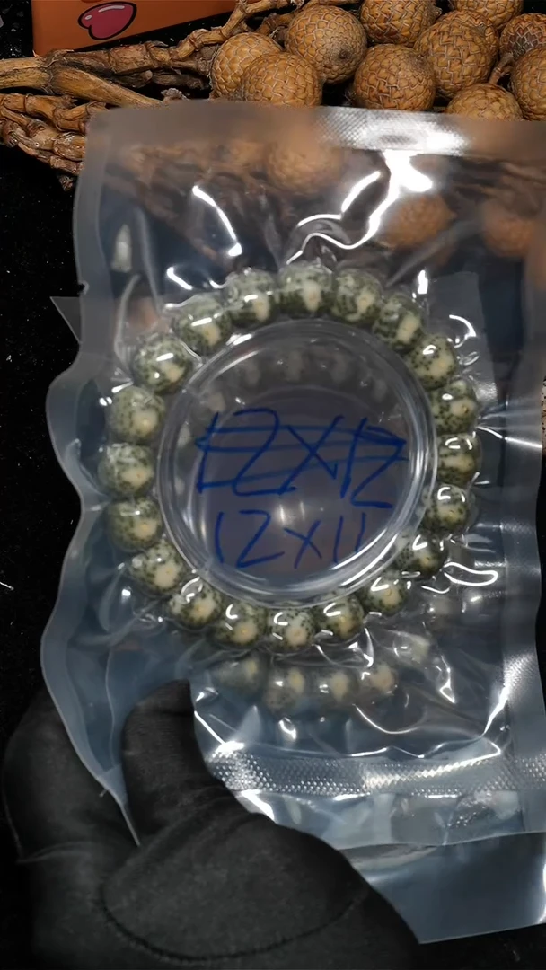 手串星月菩提12*11绿包白大眼-F01
