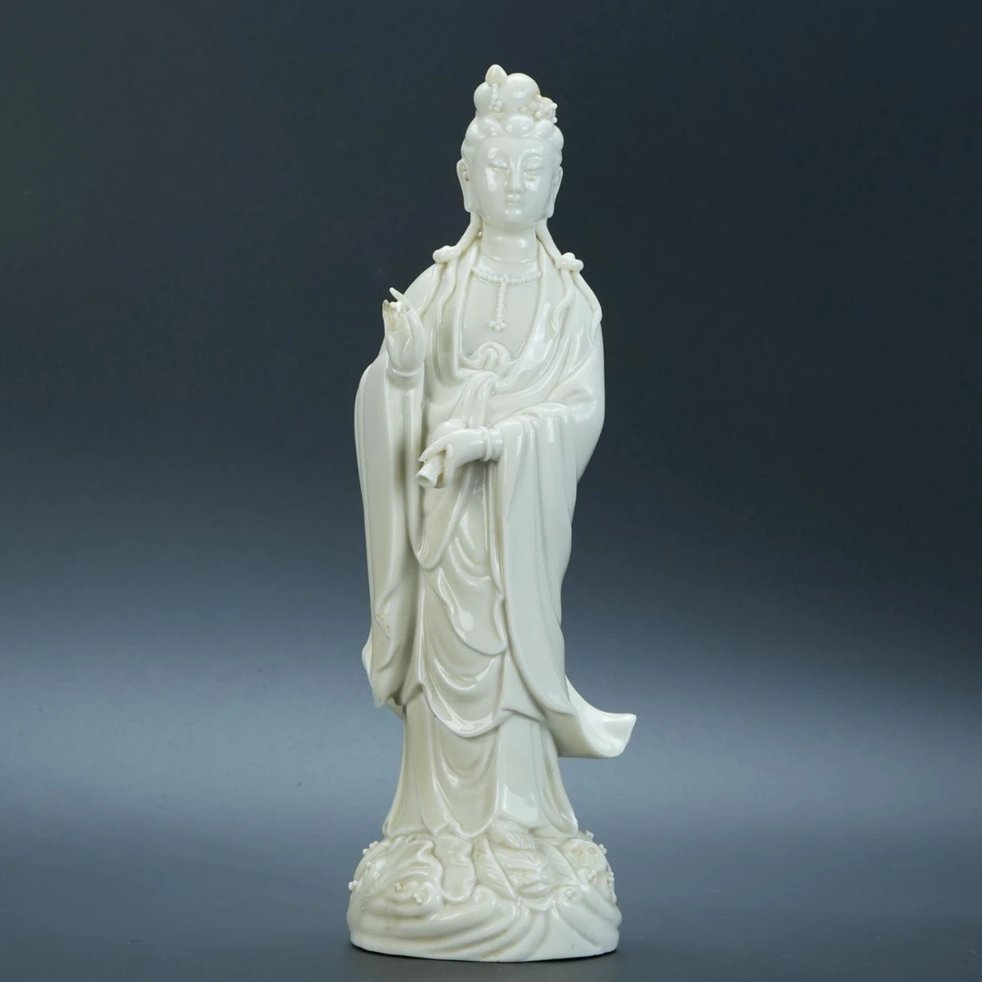 lot 11043 1592 民国 白釉手持净水瓶人物瓷雕 H:27