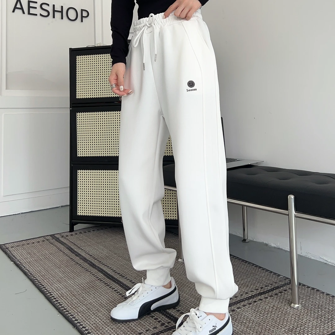 K231秋季新款时尚韩版百搭刺绣笑脸字母女士休闲运动卫裤25-139