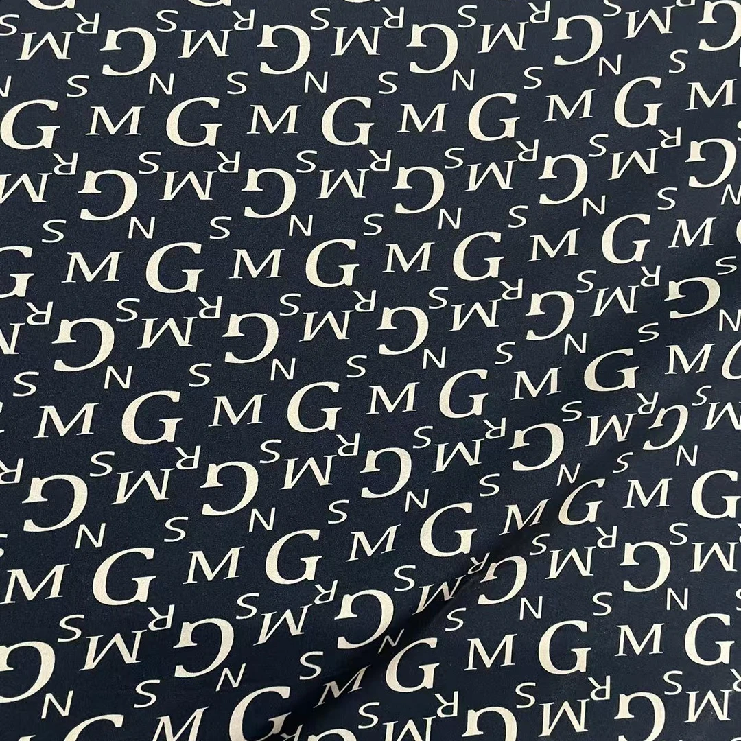 蓝底字母花时装时尚面料（不支持7天无理由）