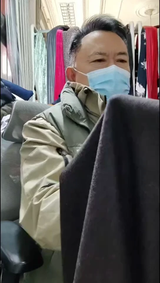 深紫咖雪花针织布料
