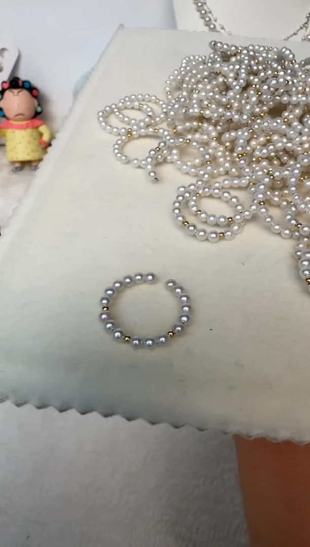 戒指18K金镶嵌淡水珍珠发其一