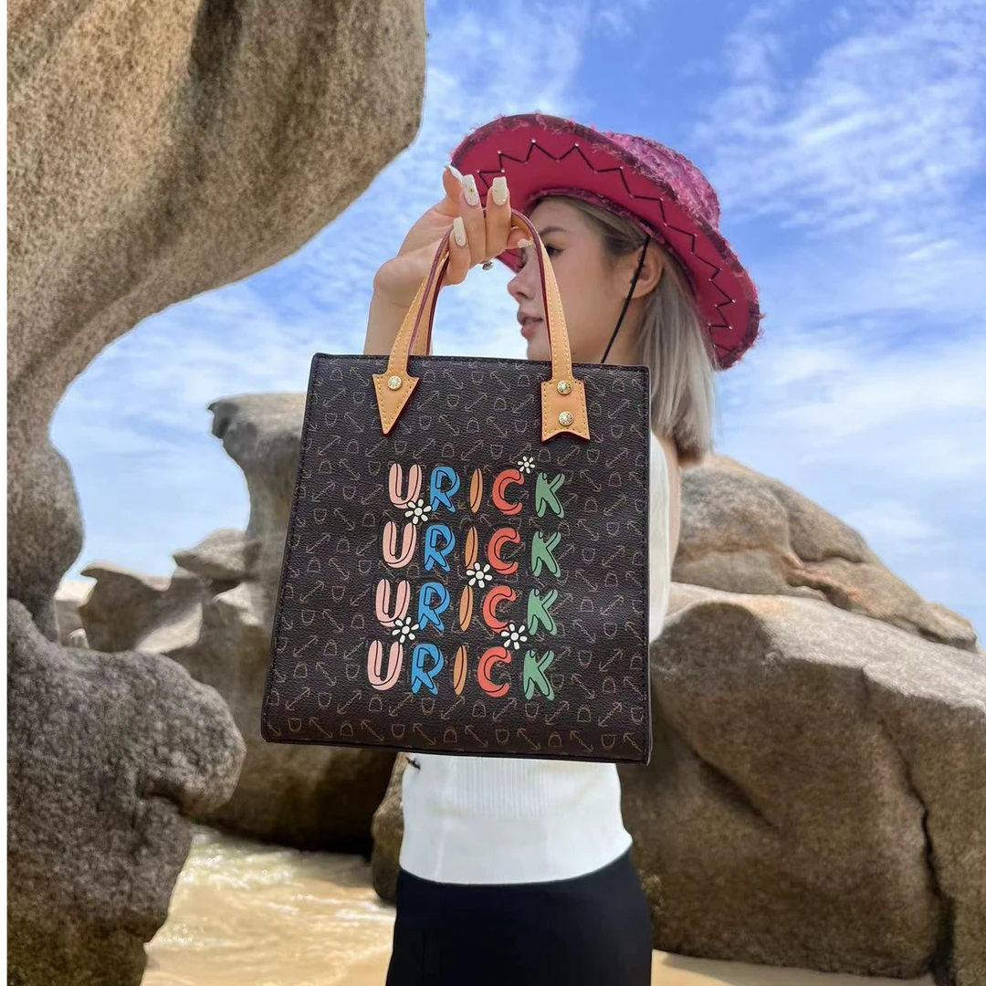 【URICK】2025秋冬新款斜挎涂鸦包咖色 G651087 时尚女士百搭斜跨