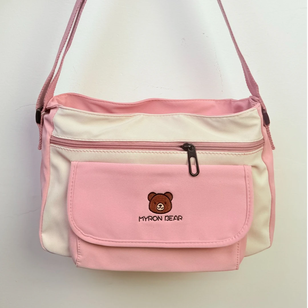 大容量单肩包斜挎包潮流休闲男女帆布包