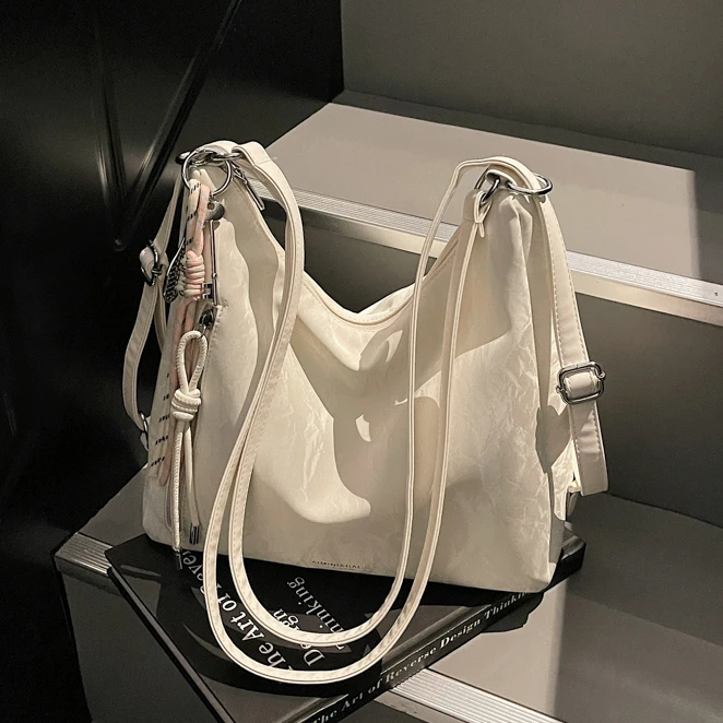 网红洋气多功能托特包女单肩双肩包2025夏季新款时尚通勤斜挎包