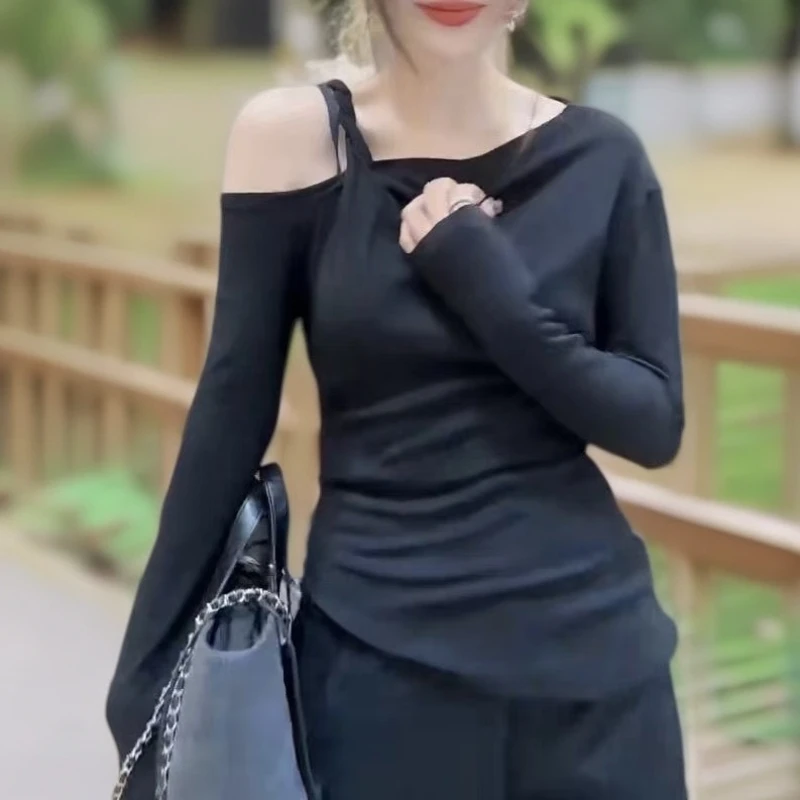 欧洲站秋季新款时尚一字肩扭结吊带条纹长袖T恤女修身显瘦打底衫