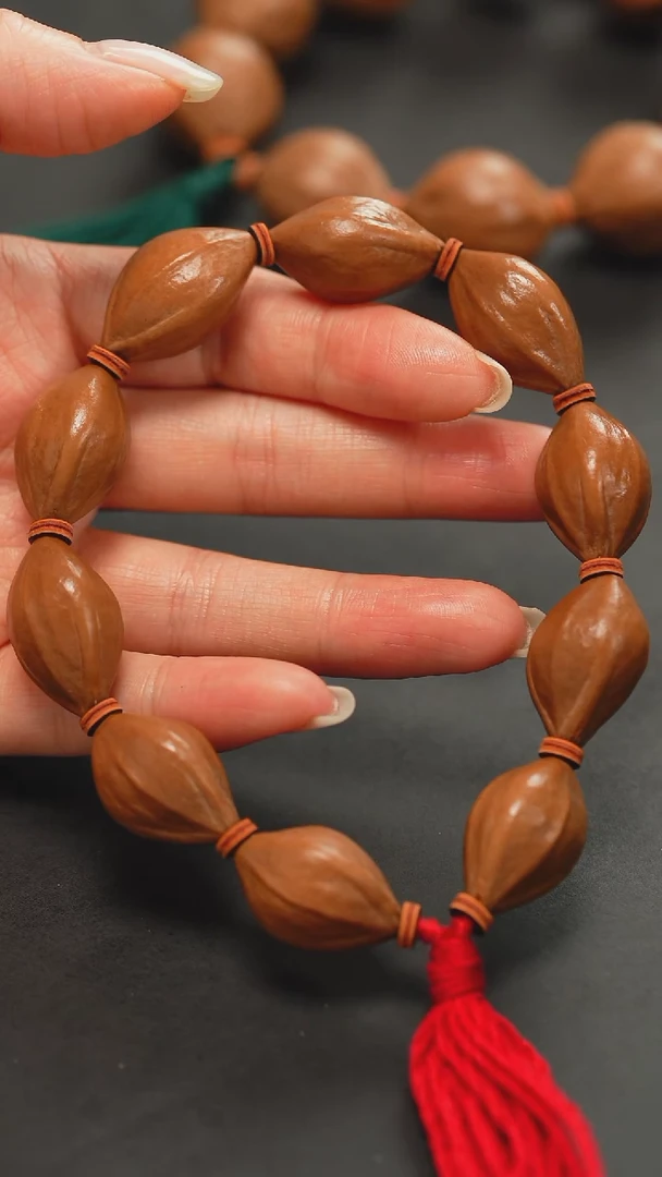 橄榄核手串三花三面佛素串