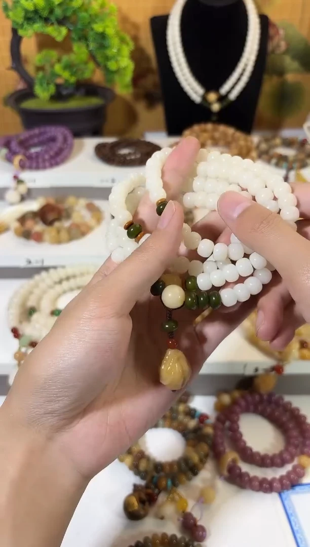 手串菩提根/象牙果卡7*9草原羊脂108颗