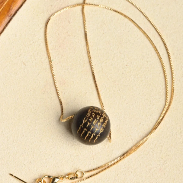 沉香越南芽庄白棋天然野玉化沉水沉香木雕五条纹吊坠