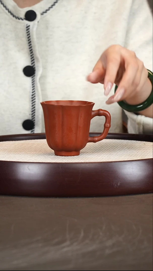 紫砂茶具朱泥筋纹带把杯