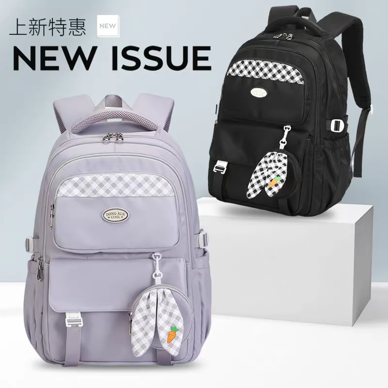 东润2025新款小学生书包初中生大容量女孩超轻便减负双肩背包韩版