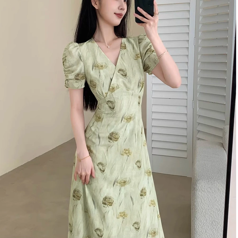 霍文萨列绿色碎花连衣裙女2025夏季新款法式显瘦温柔风V领长裙子