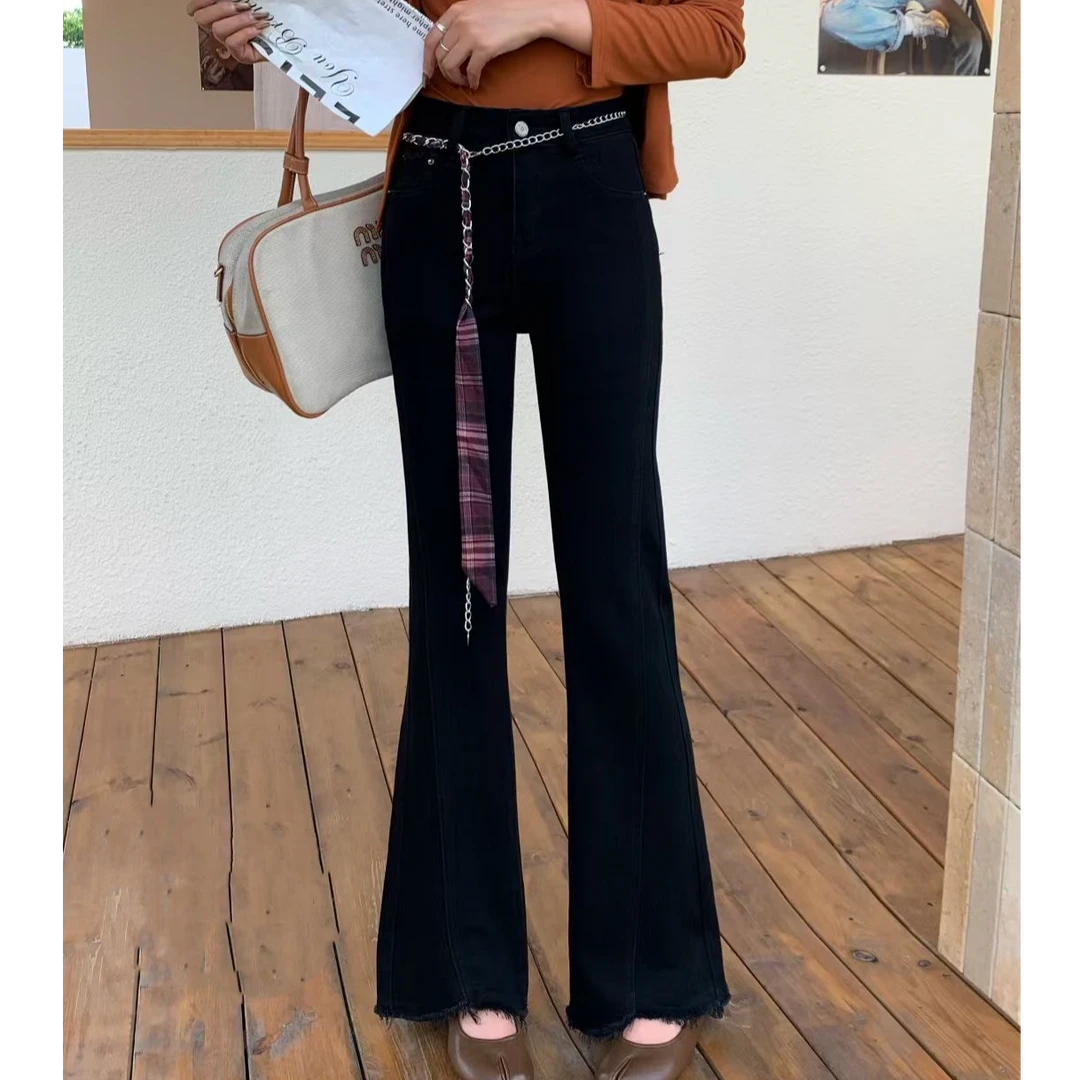 小施家韩版设计款时尚拼接显腿长喇叭牛仔裤9815