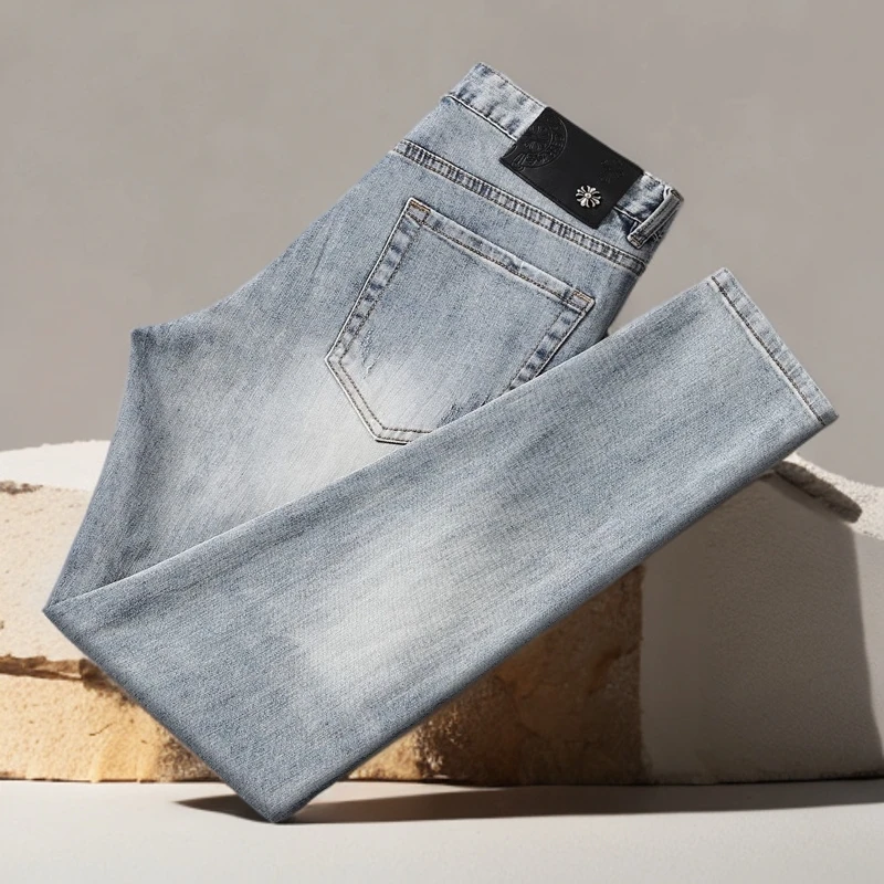 诺顿雷斯男款个性破洞补丁潮流棉弹修身小脚裤潮牌夏季印花牛仔裤