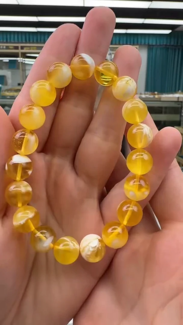 未镶嵌琥珀手链158秒拍号假一罚十