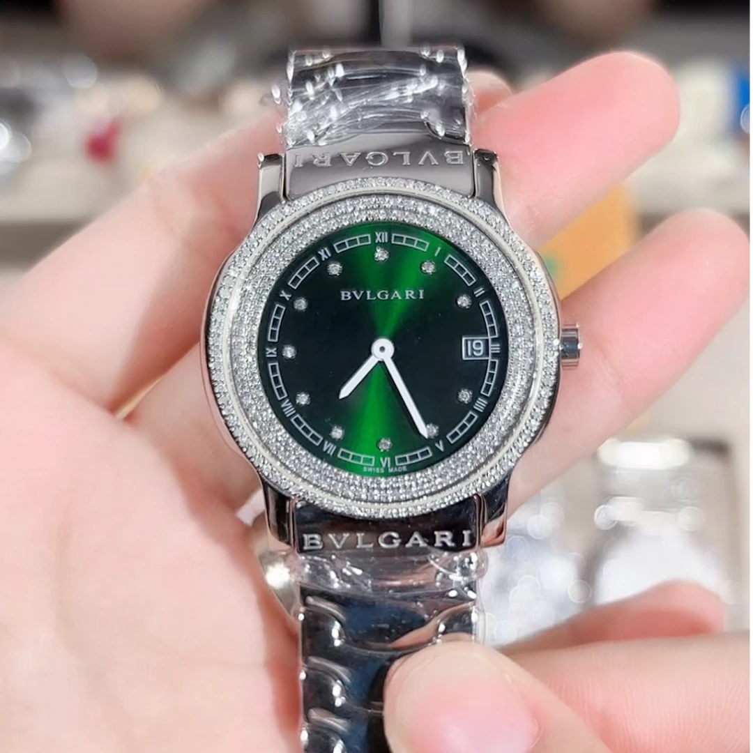 99新 BVLGARI/宝格丽 SOLO TEMPO系列35MM绿盘后钻腕表/WHT030399