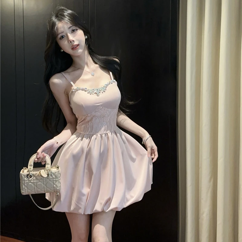 法式千金重工钉钻吊带连衣裙女夏季新款甜美收腰显瘦公主花苞短裙