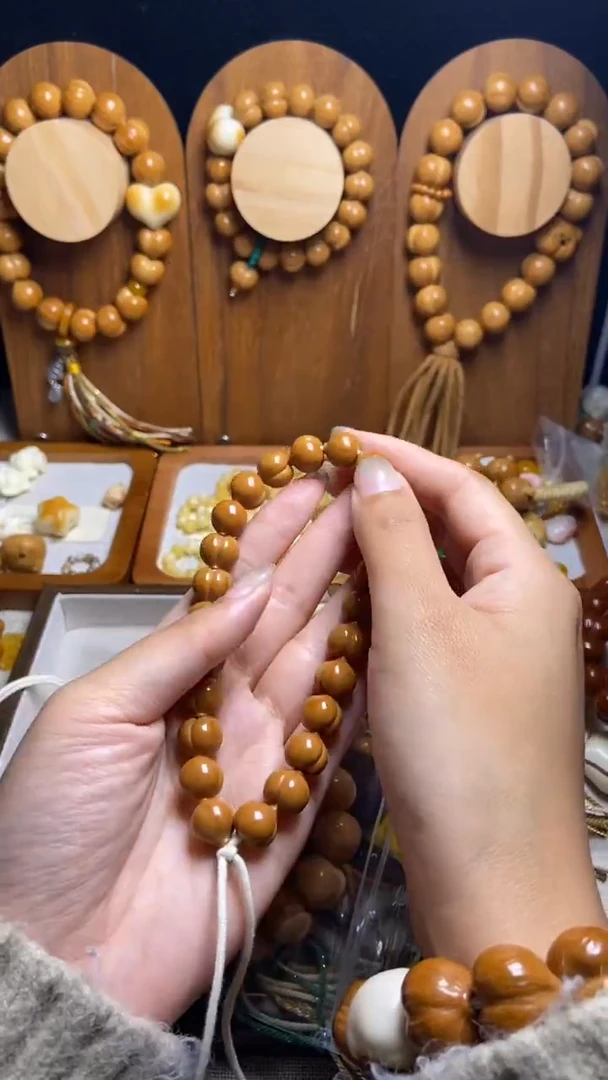 手串猴头核桃汼*富甲绿跑环藏式流苏