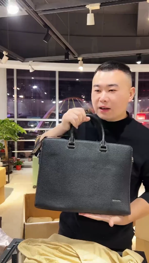 头层牛皮韩爵绅士包包皮具919