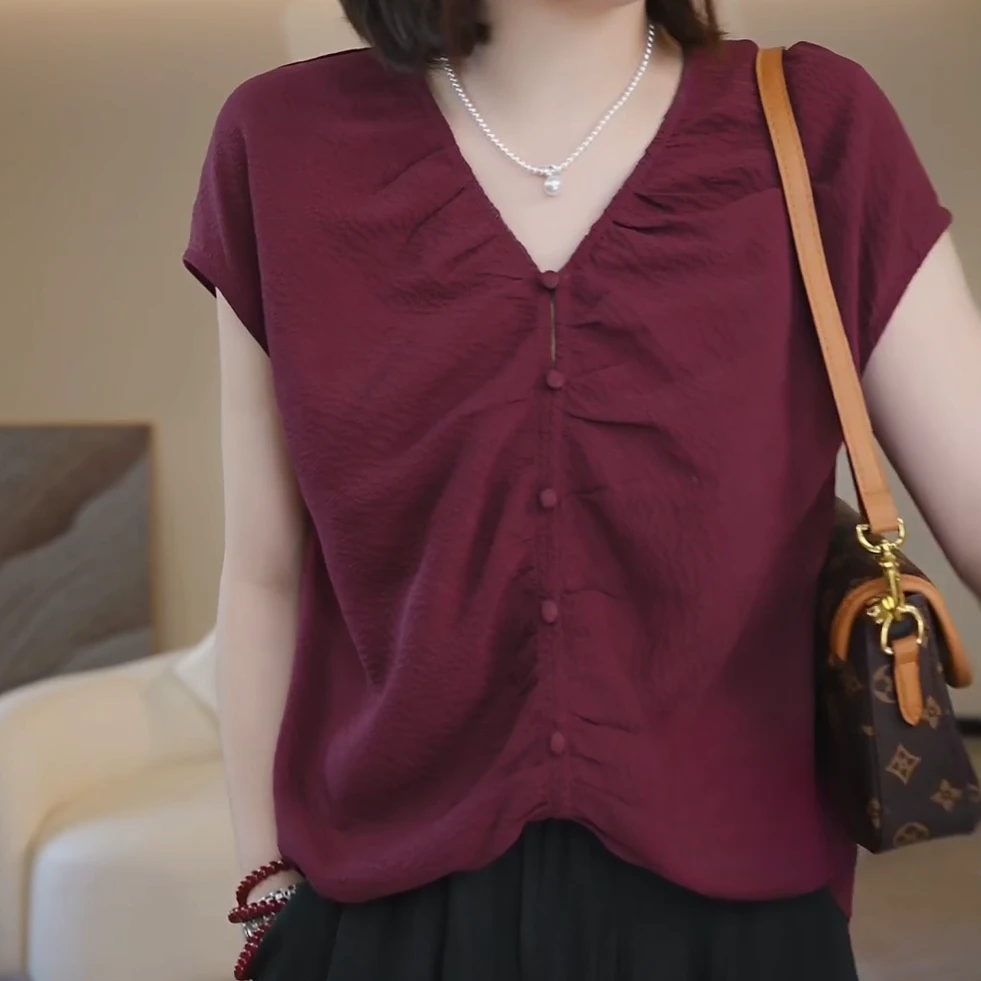 设夏季新款计师时尚百搭褶皱排扣坎肩袖上衣C5580