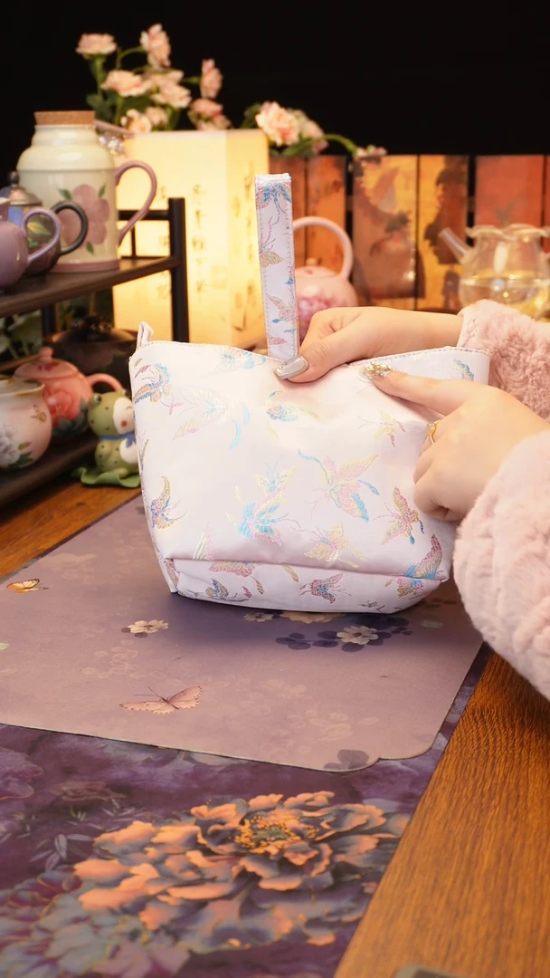 【闪购商品】粉色蝴蝶茶事包······