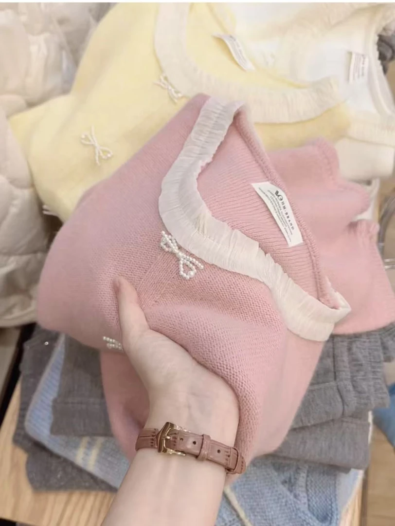 A11七言家 巨温柔！樱花粉蕾丝钉珠蝴蝶结毛衣1